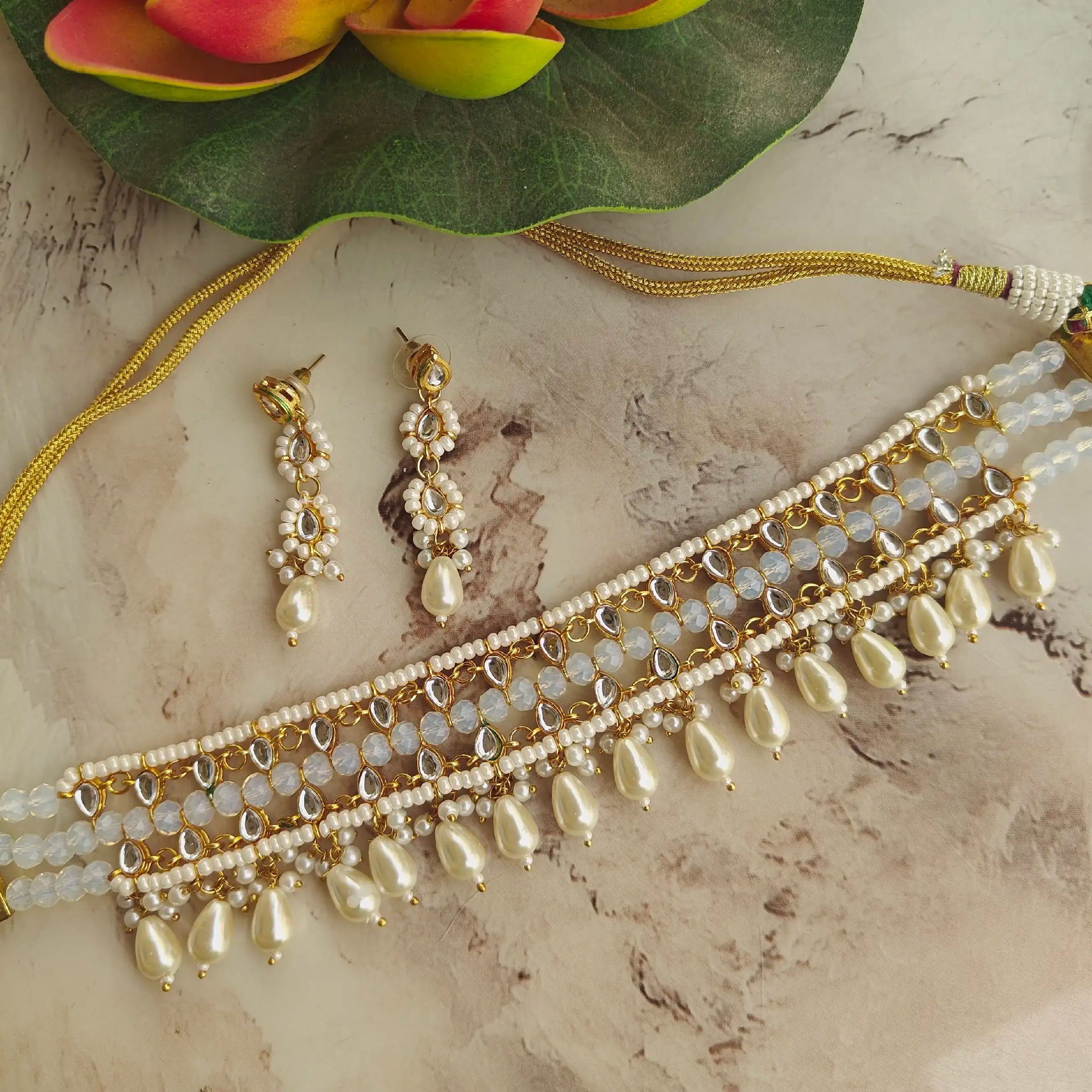 Soft And Flexible Pearl And Kundan Choker Set- White