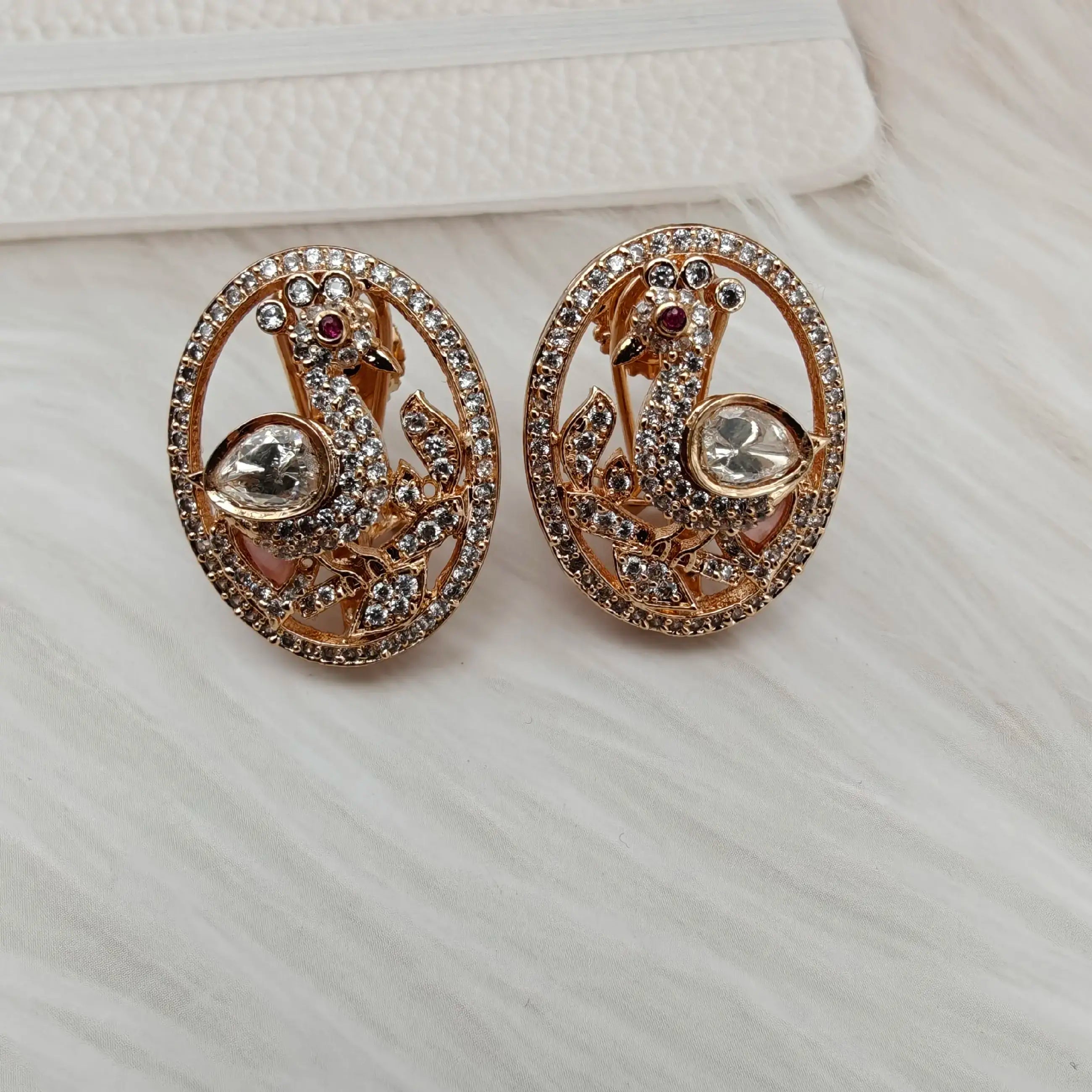 Peacock Moissanite And AD Studs- Baby Pink