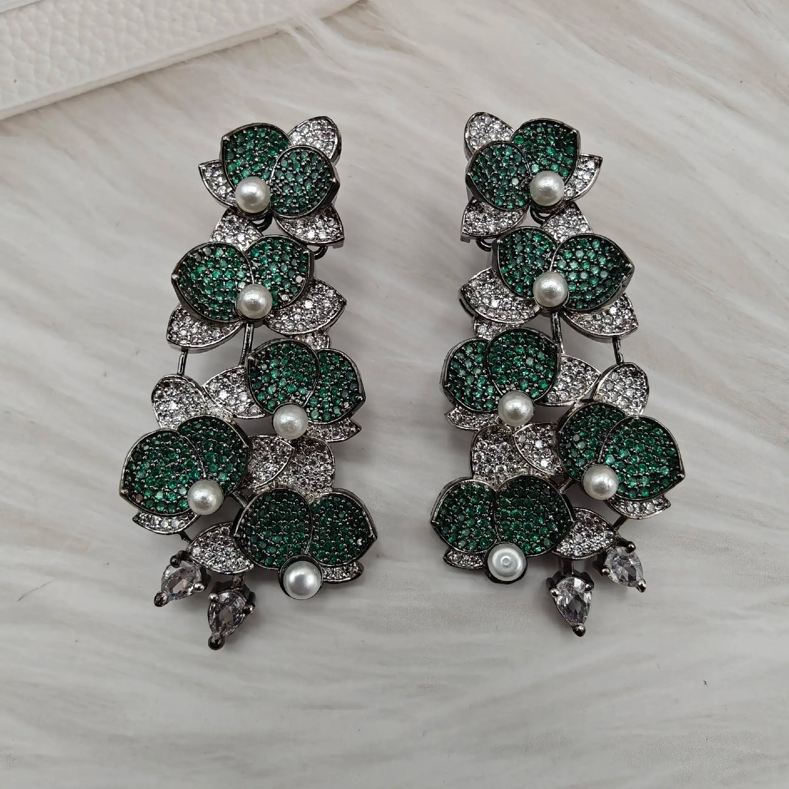 Sukoon Invisible AD Setting AD And Pearl Statement Earrings - Green