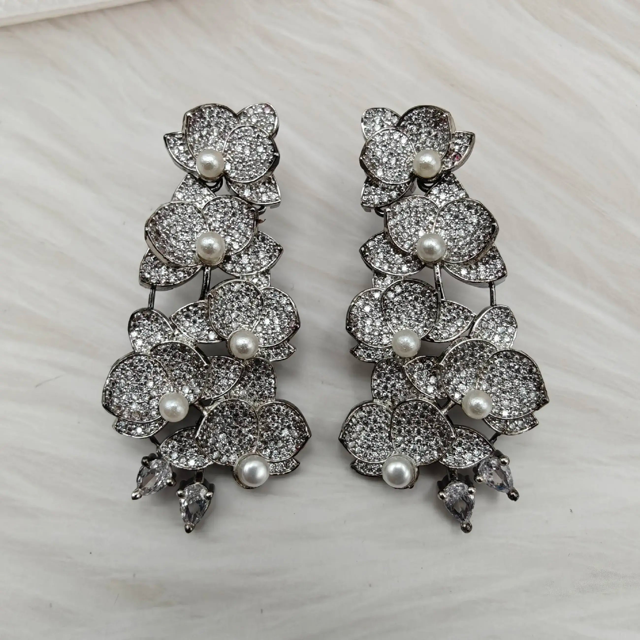 Sukoon Invisible AD Setting AD And Pearl Statement Earrings - Silver