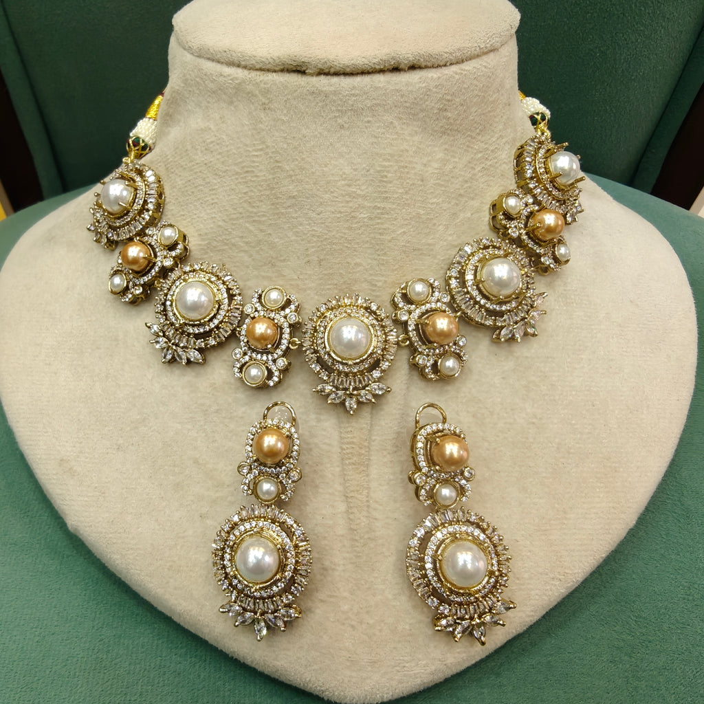 Shilpi Sabya Inspired Pearl Choker Necklace Set- White And Golden Pearl