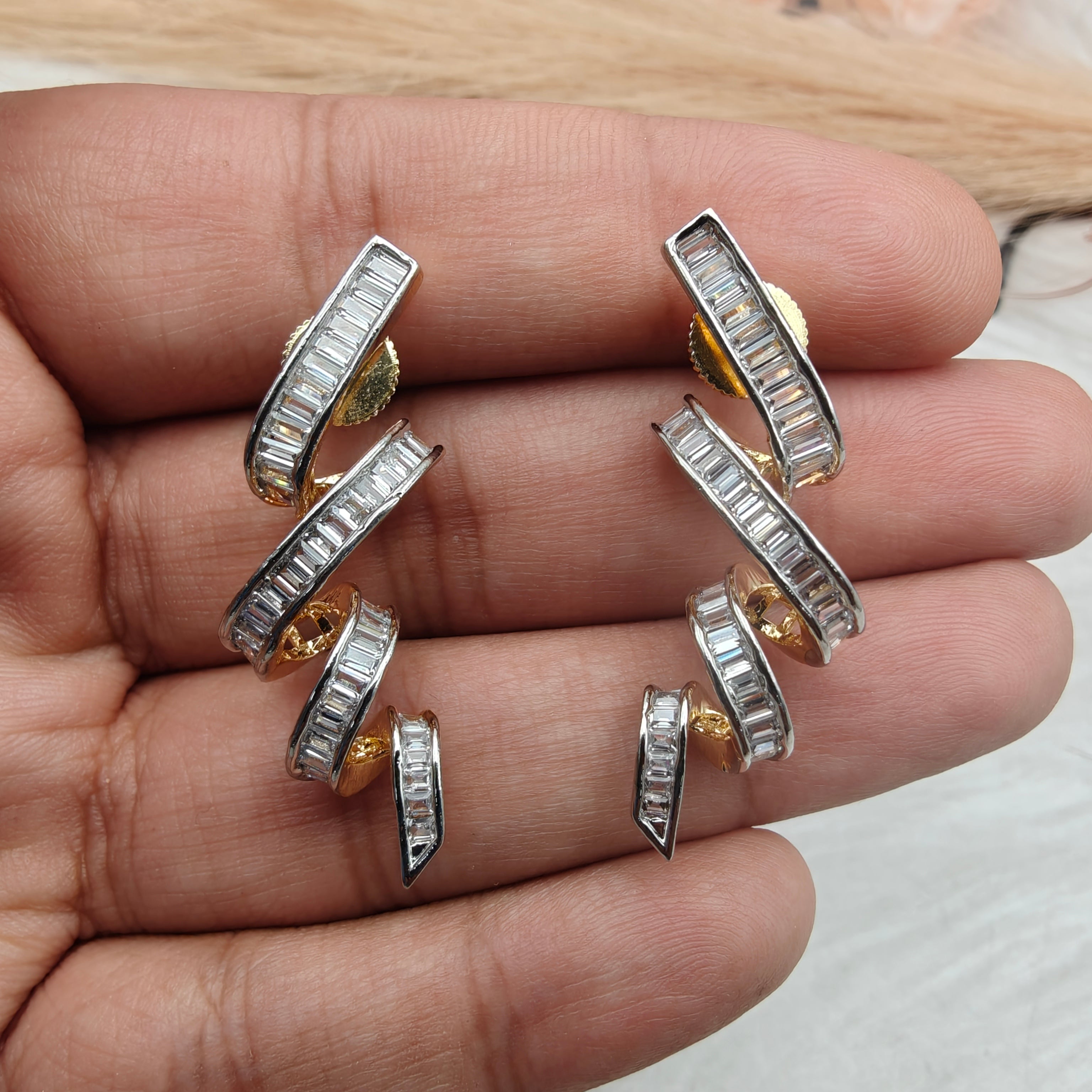 Spiral Dual Plating Baguette AD Earrings