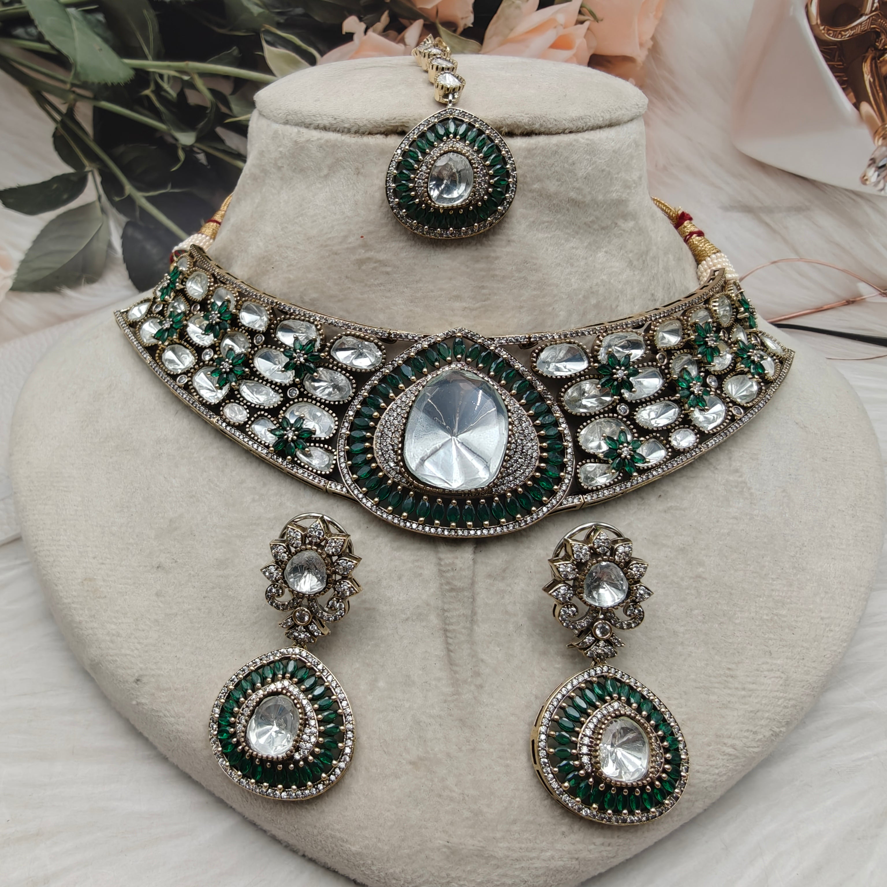 Nishika Uncut Polki Hasli Set with Mangtikka - Green