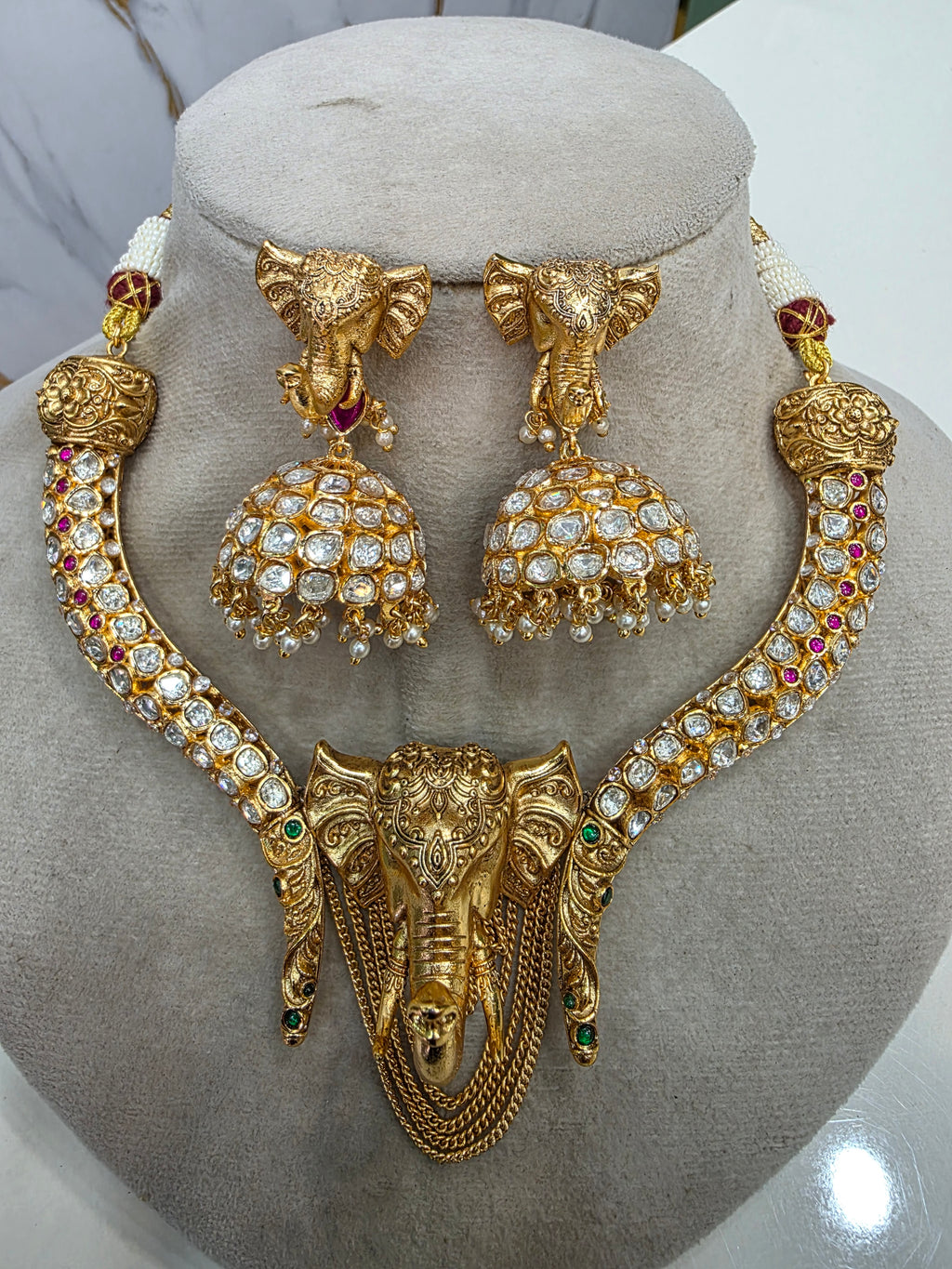 Vigneshwari Ganesha Gold Plated Hasli Set- Ruby Green