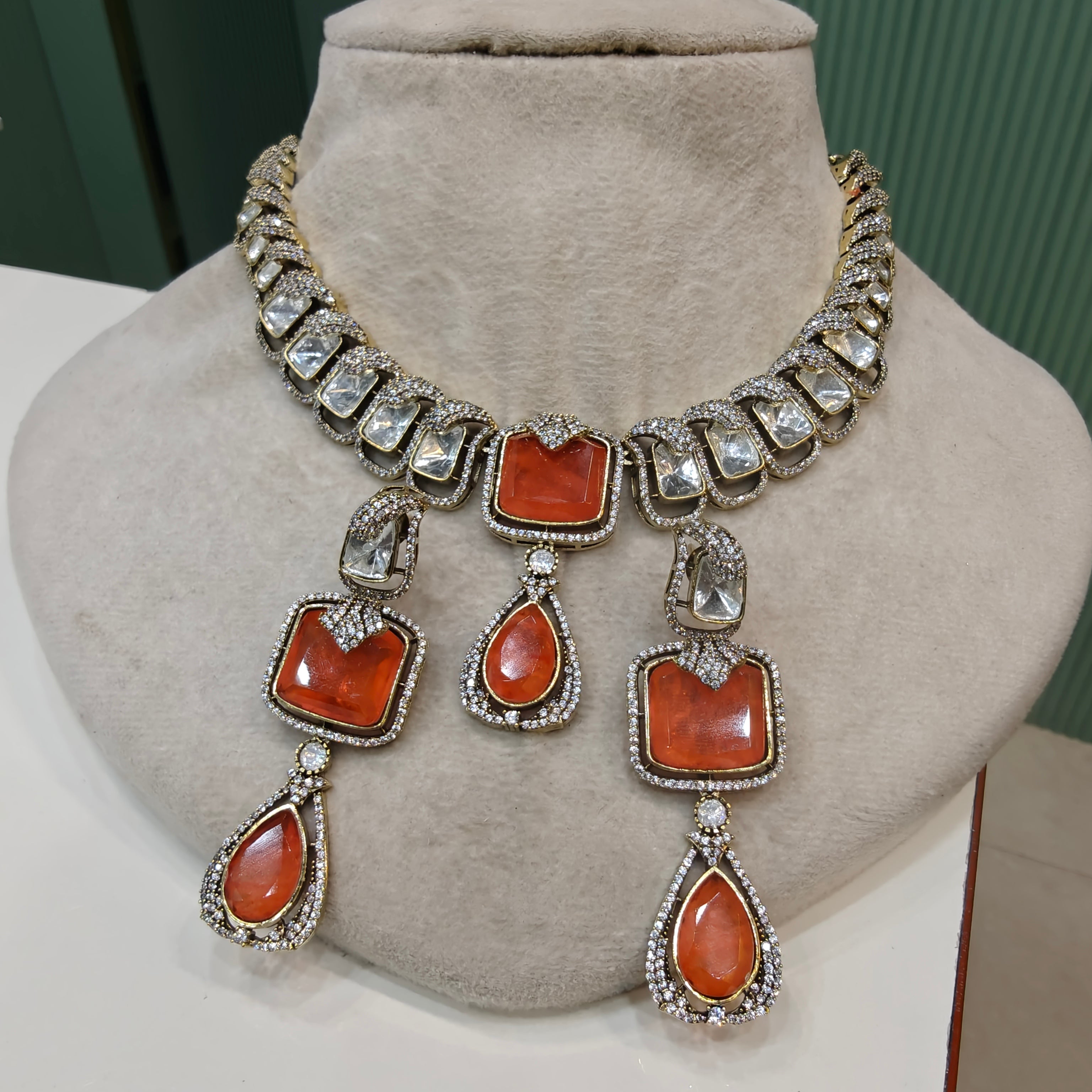 Madhumita Doublet Polki Necklace Set- Orange