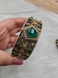 Meenakshi Dual Tone Handcrafted Doublet Handcuff- Emerald