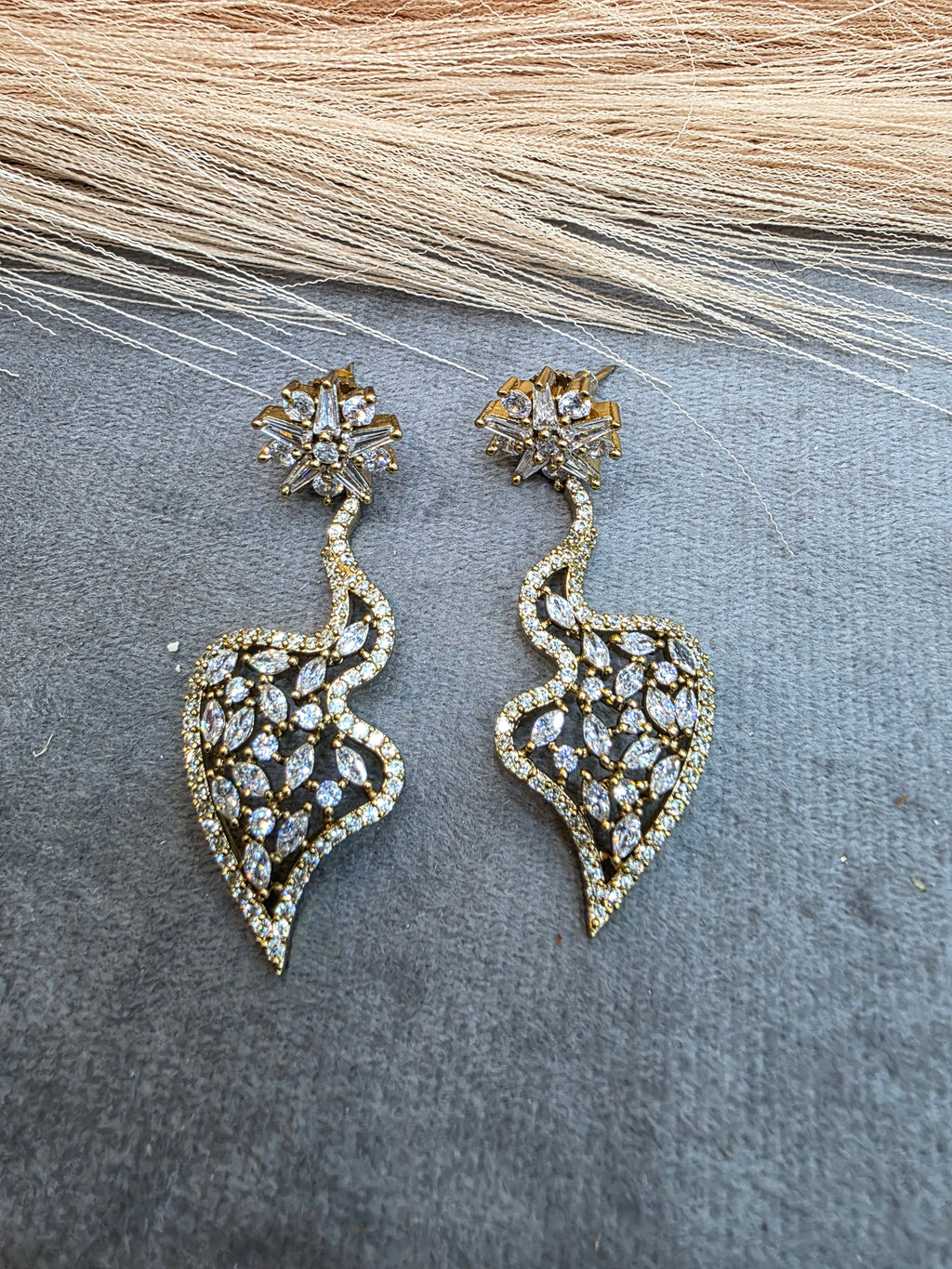Jigna Starcut AD Earrings- Golden