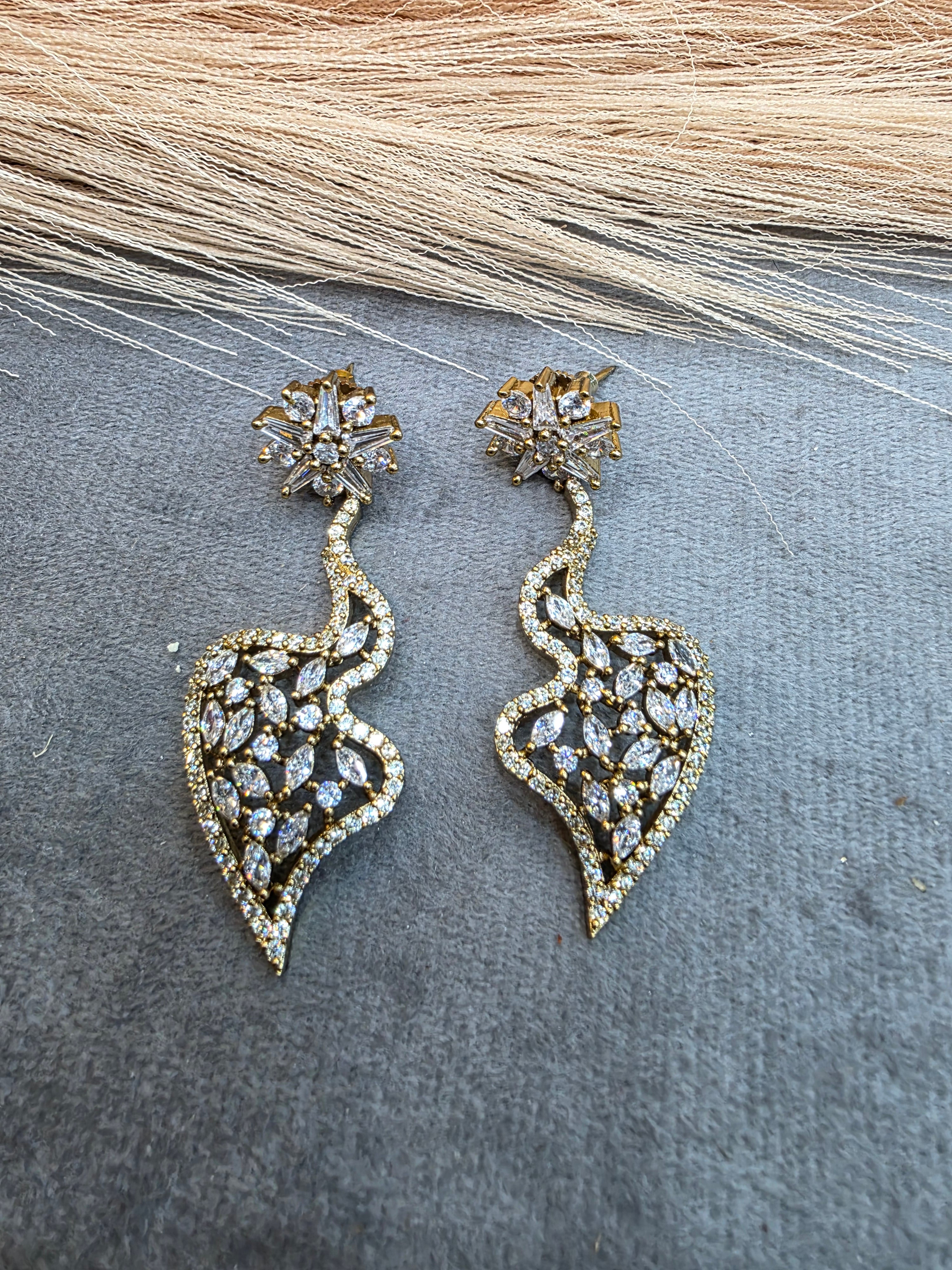 Jigna Starcut AD Earrings- Golden