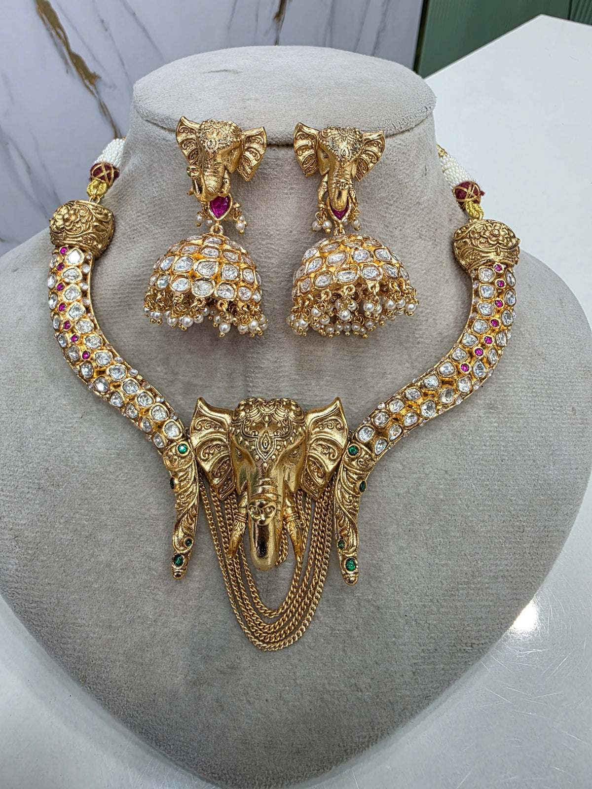 Vigneshwari Ganesha Gold Plated Hasli Set- Ruby Green