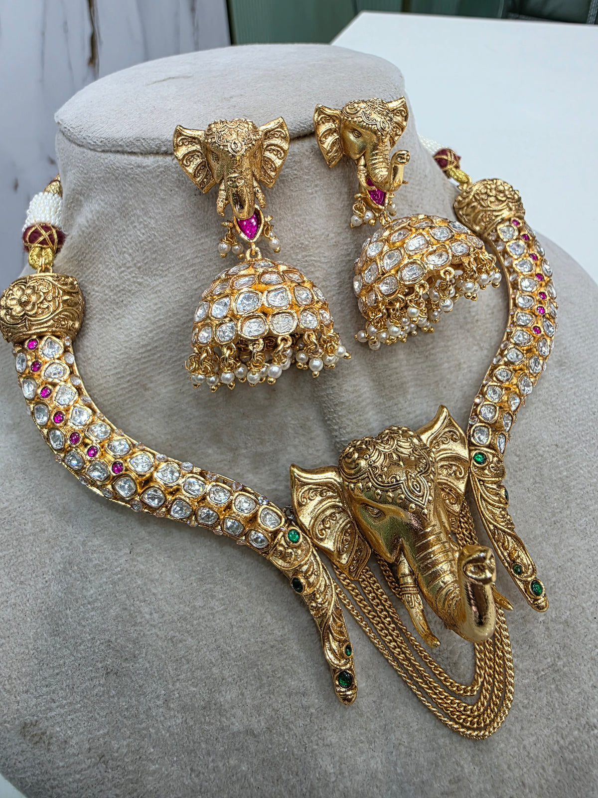 Vigneshwari Ganesha Gold Plated Hasli Set- Ruby Green